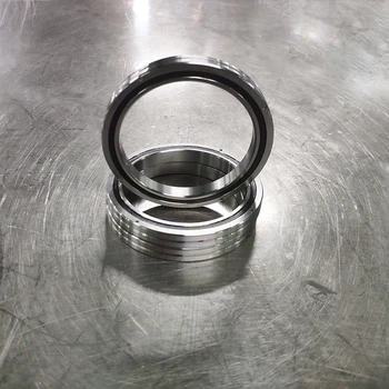 Big size china factory supplied high precision high load cross roller bearing rb90070 900mm*1050mm*70mm