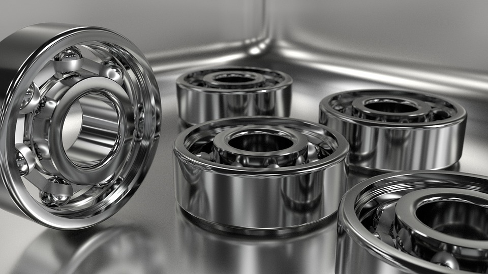 Exploded view of an open deep groove ball bearing showing internal components