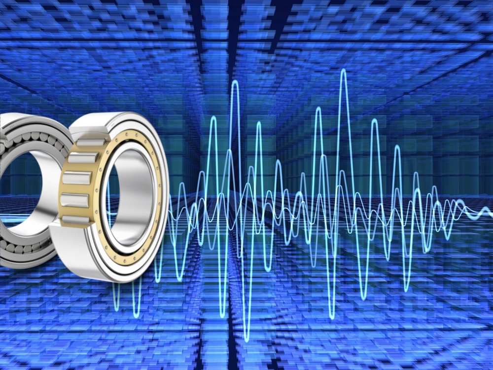 Illustration of a cylindrical roller bearing with sensors monitoring vibrations.